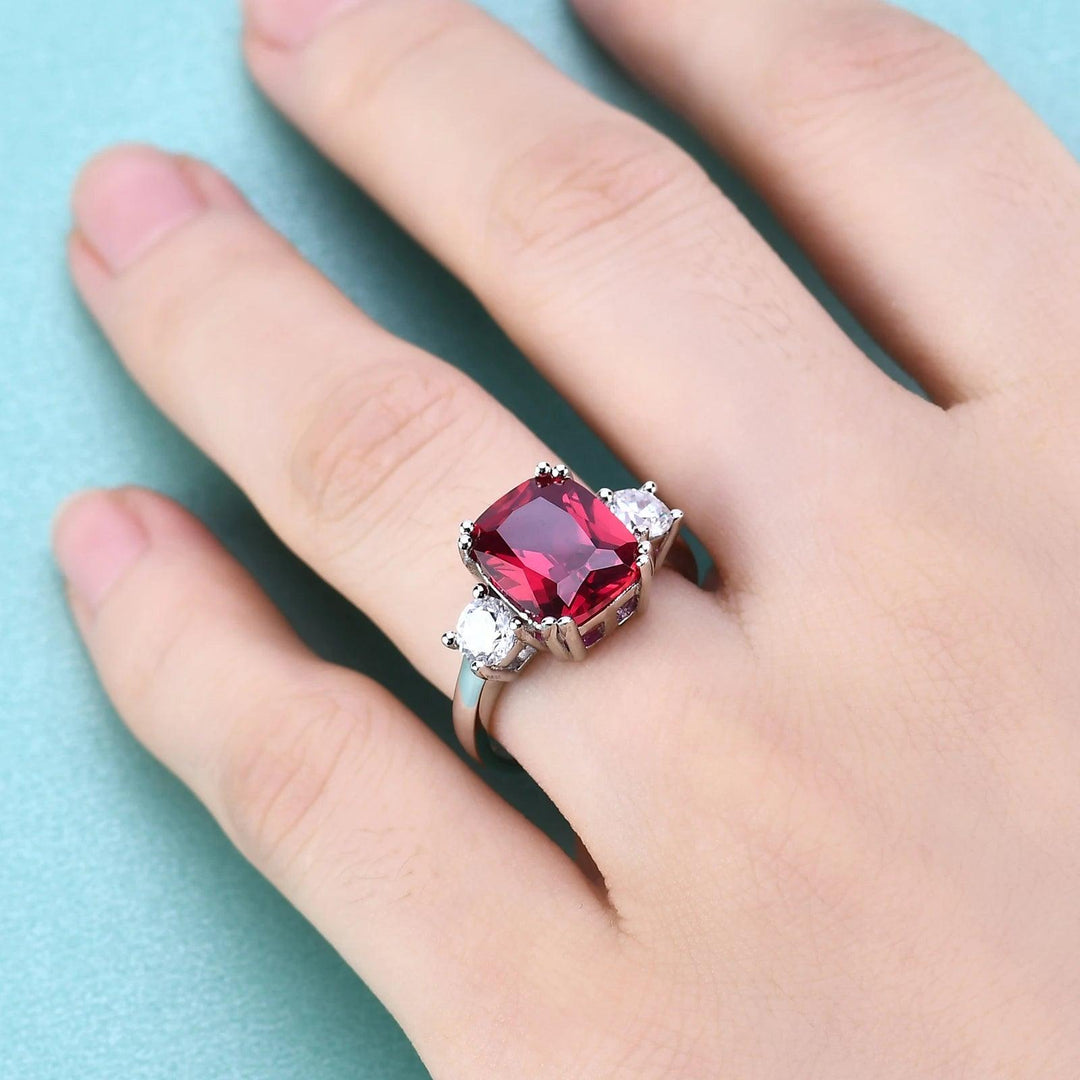 5CT Ruby Ring With CZ Side Stones 