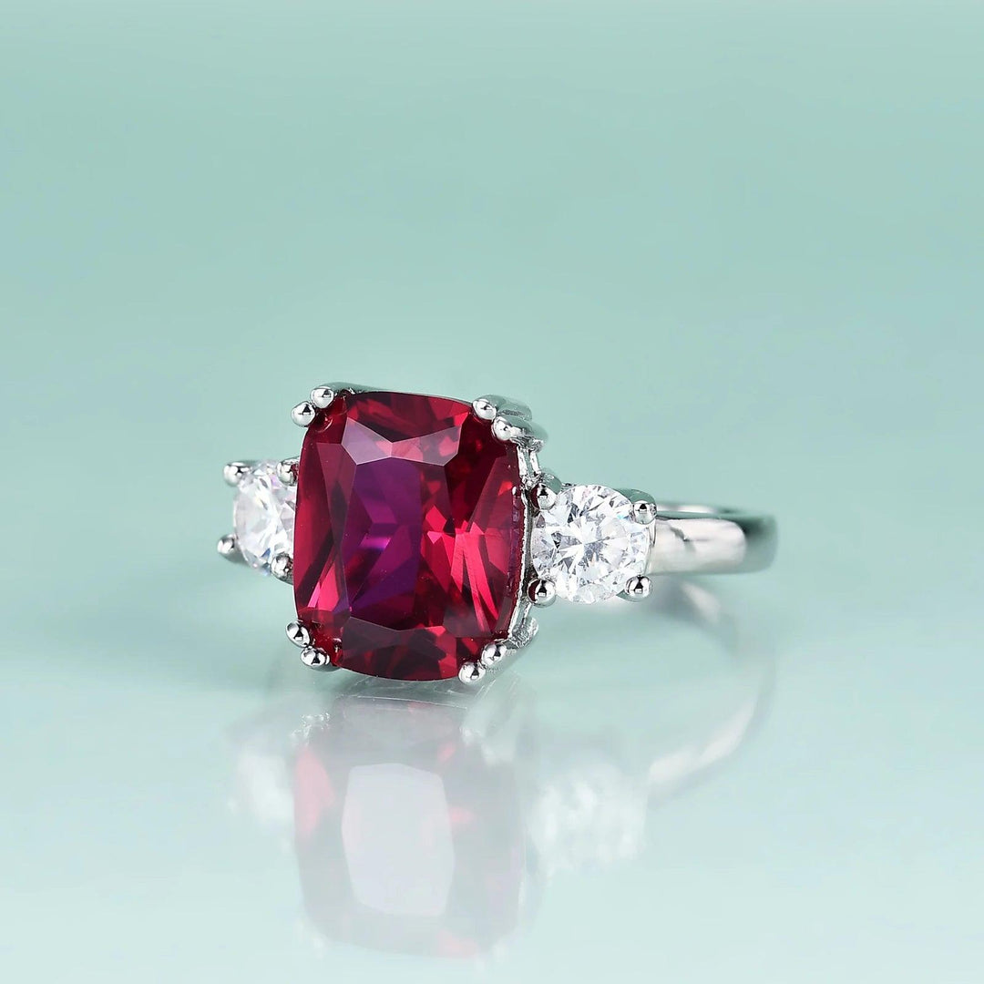 5CT Ruby Ring With CZ Side Stones 