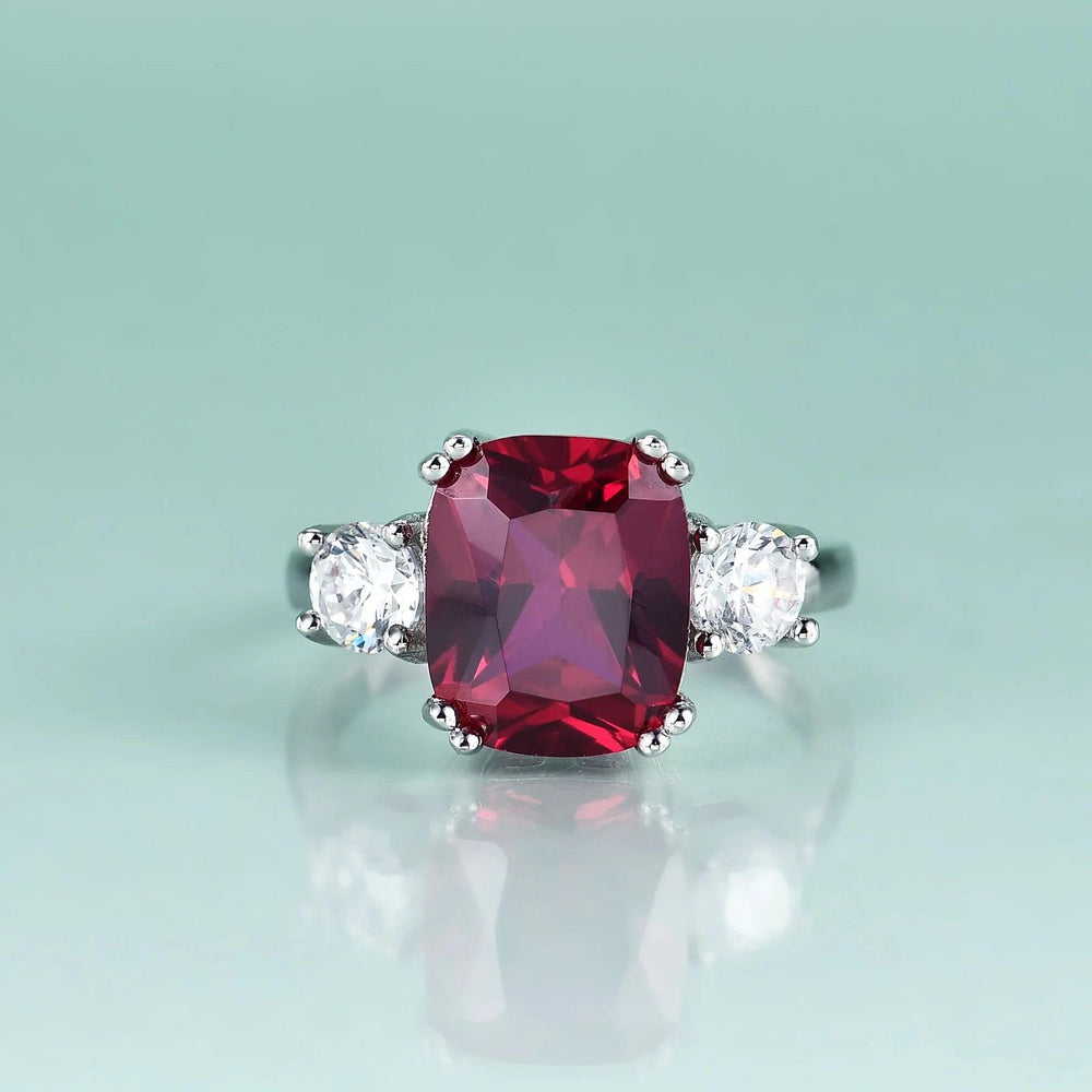 5CT Ruby Ring With CZ Side Stones 